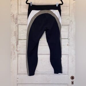 NWOT ALALA Black with Gold & White Leggings